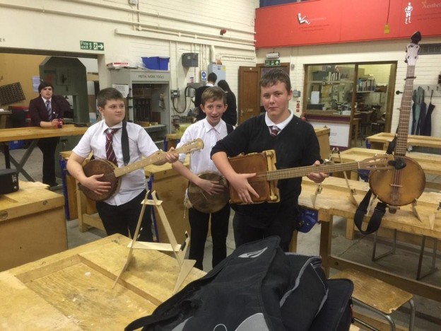 Forfar Academy Pupils trying out a few banjos. Photo by Mr Baldie.